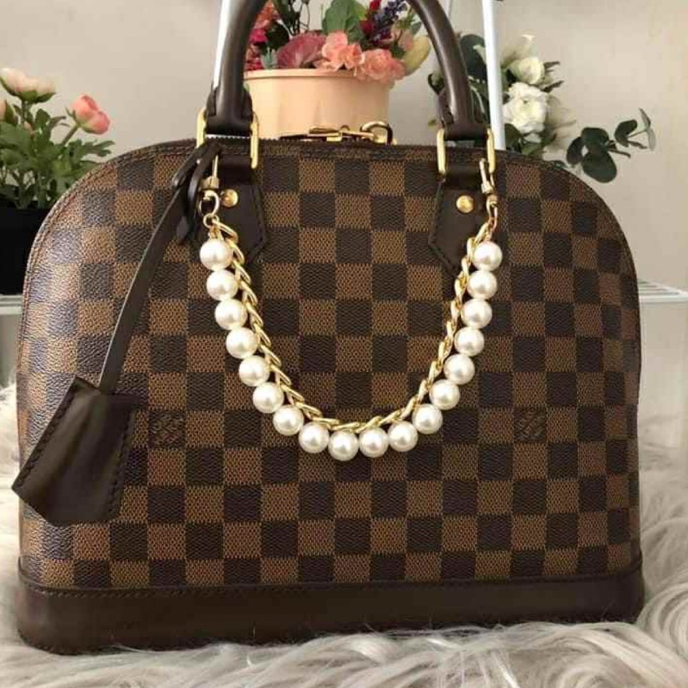 Elegant Brown Checkered Handbag with Pearl Accent Price is Firm